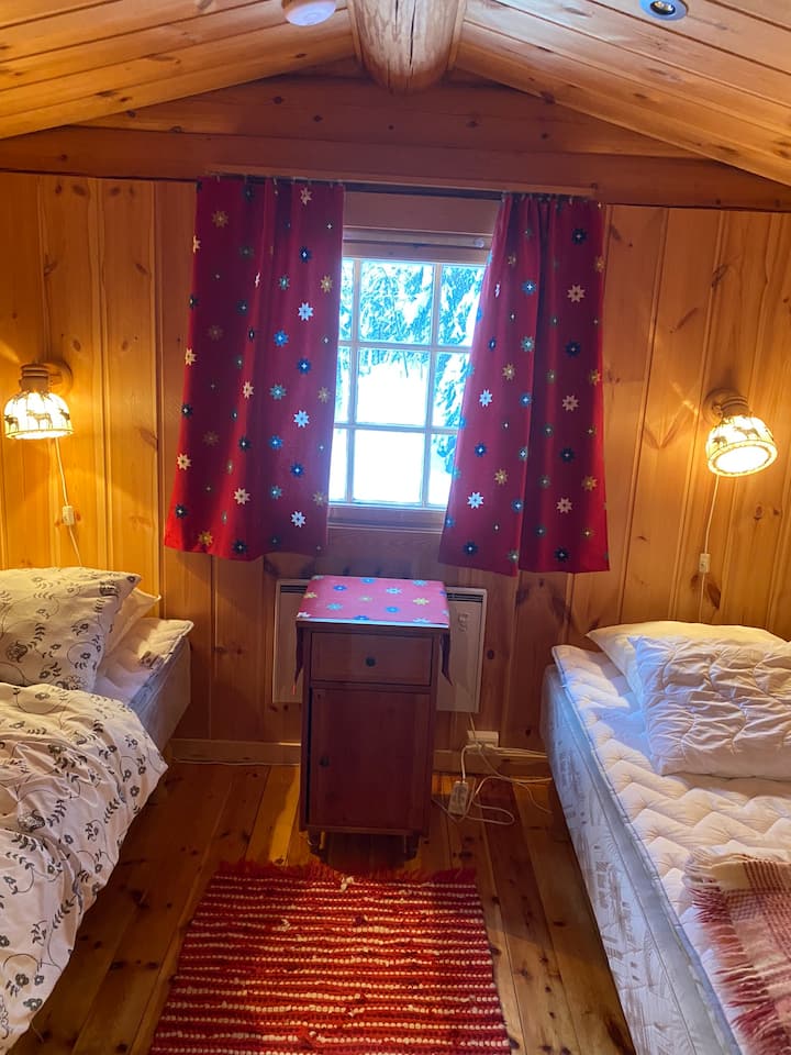 Spavaća soba 1 s dva kreveta za jednu osobu