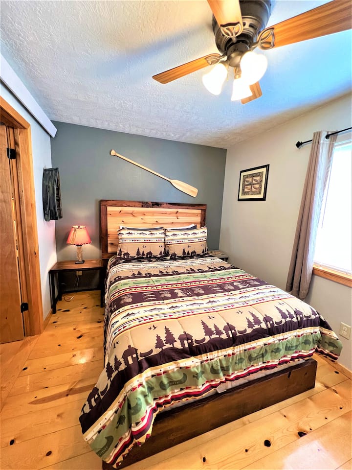 Queen bedroom with AC unit