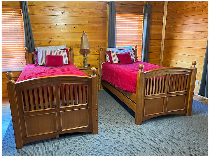 The Joines room, 2 twin-sized beds and room darkening draperies.