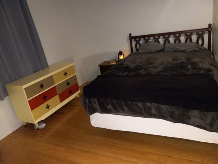 2nd upstairs bedroom that faces Kemp St.