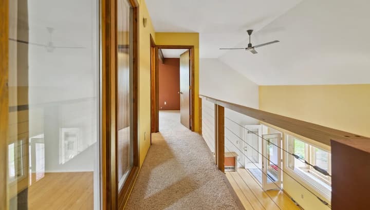 Top floor view looking into master bedroom.