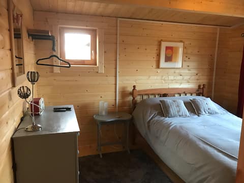 Log cabin in tiny village.