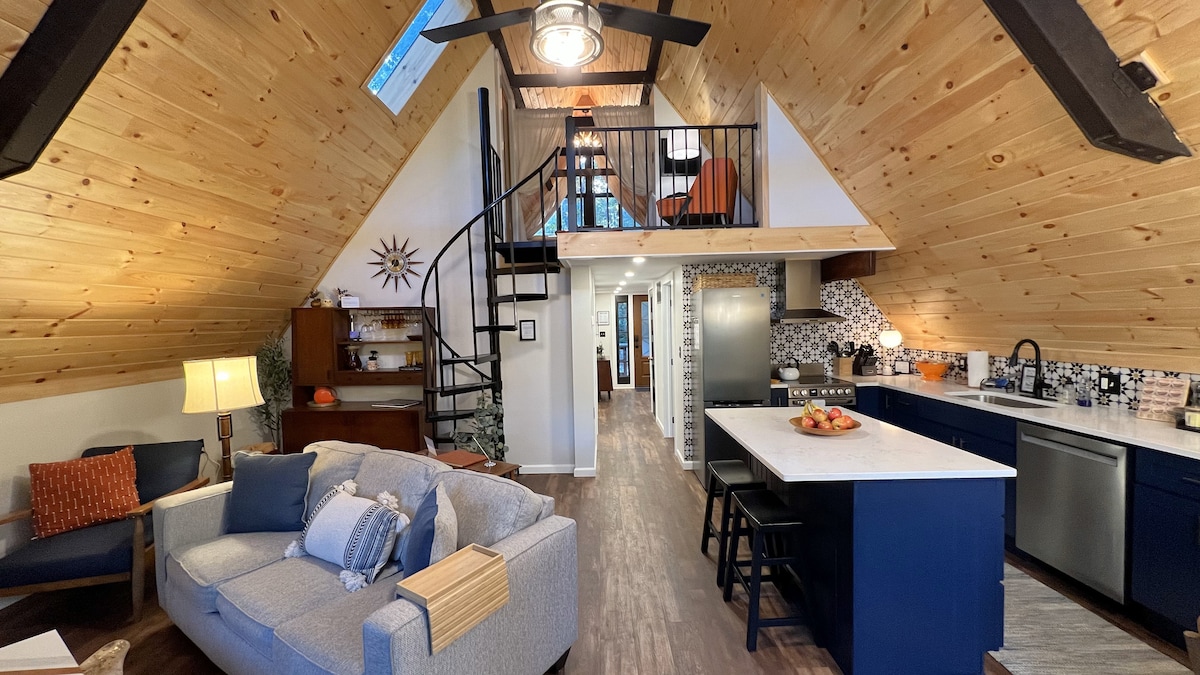Open Living Room, Kitchen & Dining Area with Vaulted Cedar Ceilings & Exposed Beams