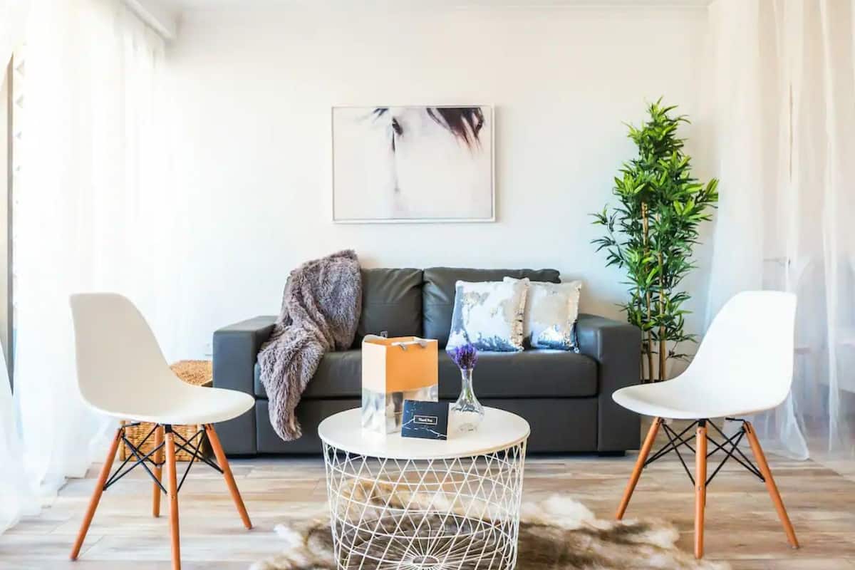 Living room with foldable sofa.