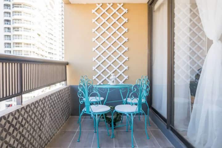 Balcony with now grey chairs to view the buzzing life on Oxford Street or relax watching the sunset/sunrise.