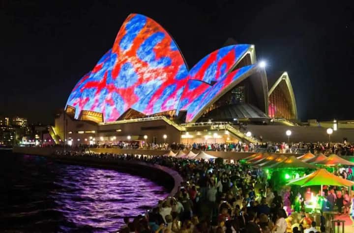 The bustling Circular Quay (pronounced 'key') has incredible views, amazing buskers and top class restaurants and bars. This is the VIVID light show that is back on since 2022.