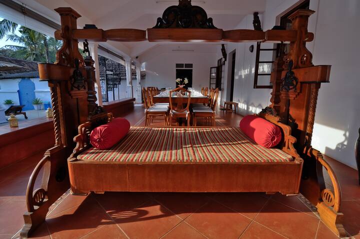 Antique swing bed in the dining verandah