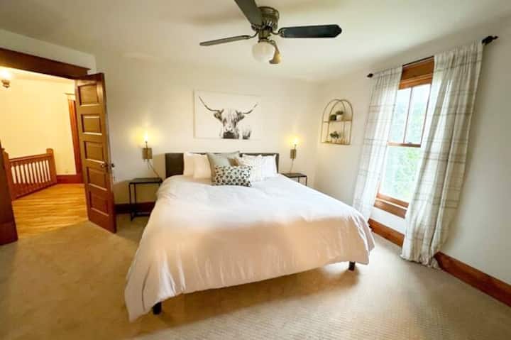 {MASTER BEDROOM} The ultimate convenience and richness in the master bedroom, where functionality meets serenity. The laundry room just steps away, and the ensuite bathroom offers a private sanctuary for relaxation.