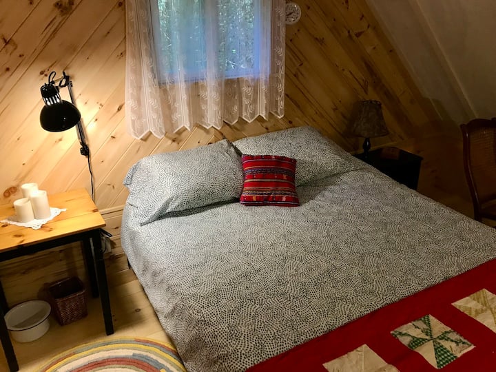 Queen-sized bed in loft. Rocking chair and extra blankets to keep you comfortable.
