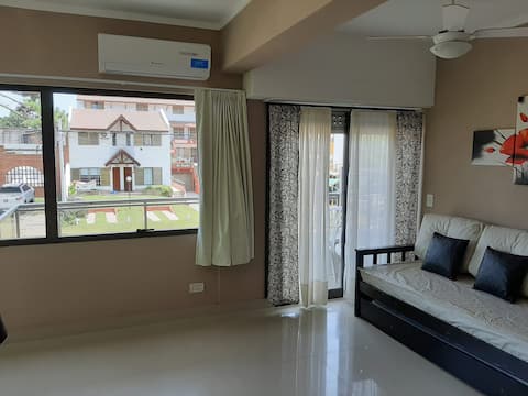 Top performing Airbnb: Spacious apartment with patio and grill in Partido De Villa Gesell