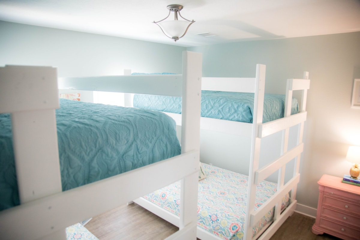 Bedroom 2 is quite large and has 2 queen-over-queen bunk beds.
