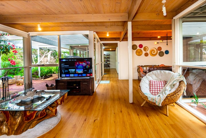 Relax in nature with 4K cinema room near Air port.