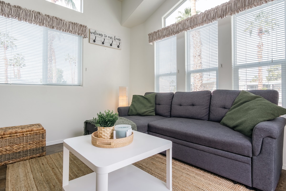 Sala de estar con sofá cama