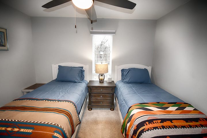Upstairs bedroom with twin beds