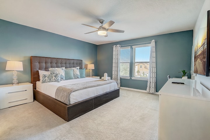 Master bedroom with brand new KING mattress, 55" Samsung Smart TV, office work space and an ensuite bathroom.  There is a crib available at the home.  It is on wheels so can easily be rolled into any room. Dimensions are 40"L x 26"W x 38”H. 