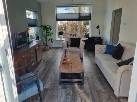 Spacious corner house with large garden