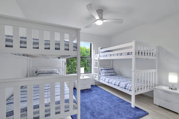 3rd bedroom sleeps 4 and offers a closet with a built-in closet system. 
