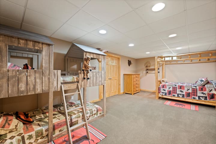 Lower level twin over twin bunks
Full size bed