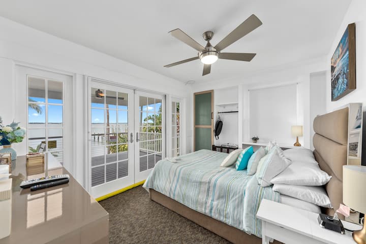 Riverfront queen bedroom on the home's main level