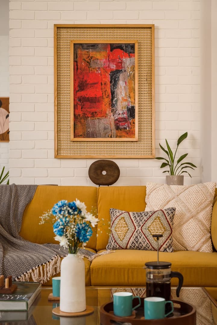 ✨A corner that captures the art of slow living✨ 
Warm hues, textured cushions, and conversations brewed just right.✨