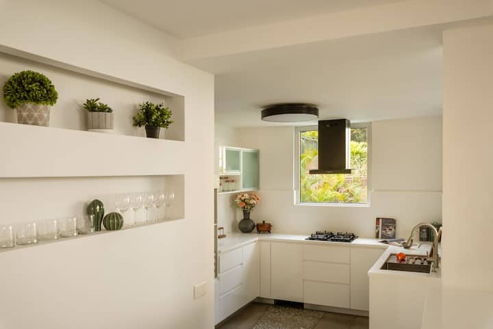 ✨A kitchen that lets the outdoors in✨ 
Sleek, minimal, and filled with light, it's where modern design meets natural charm.✨