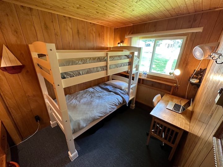 third bedroom with second 'home office' setup