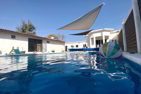 LEO's house, heated pool, billiards, and garden