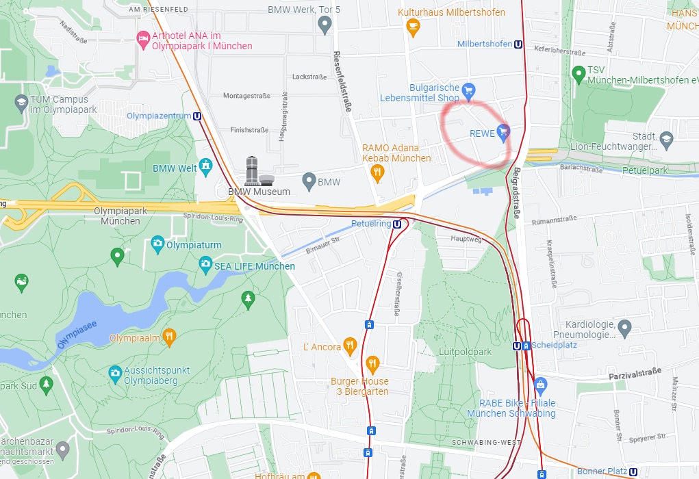 A detailed map view of the München-Milbertshofen area, highlighting nearby amenities and transport options. Key locations, including the U-Bahn station and local shops, are clearly marked, indicating the layout of streets and surrounding attractions.