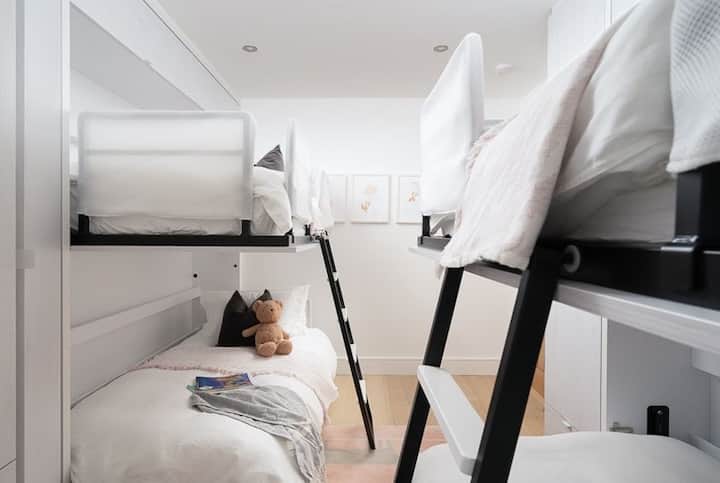 Third bedroom with innovative smart beds (configured as either four single beds, bunk beds or cabin beds).