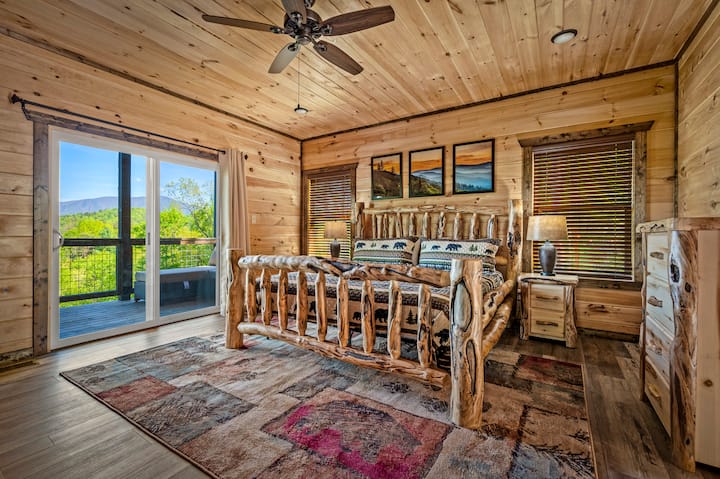 The master bedroom is located on the main level and has a king size bed.