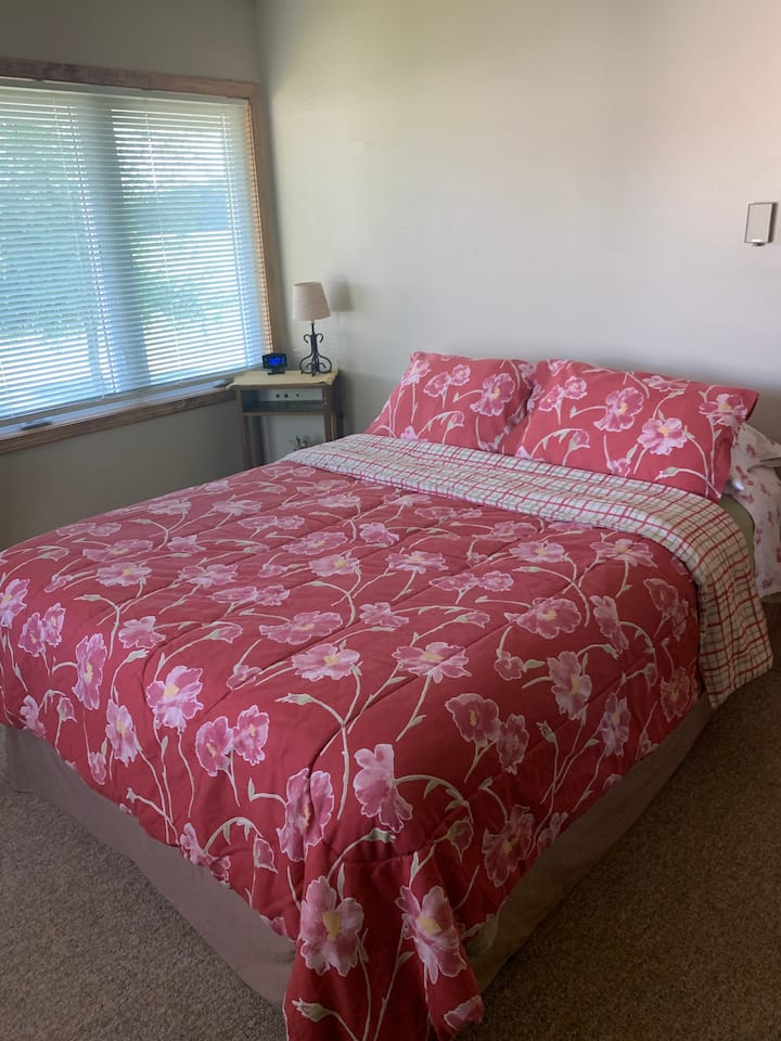 Upstairs bedroom with queen mattress