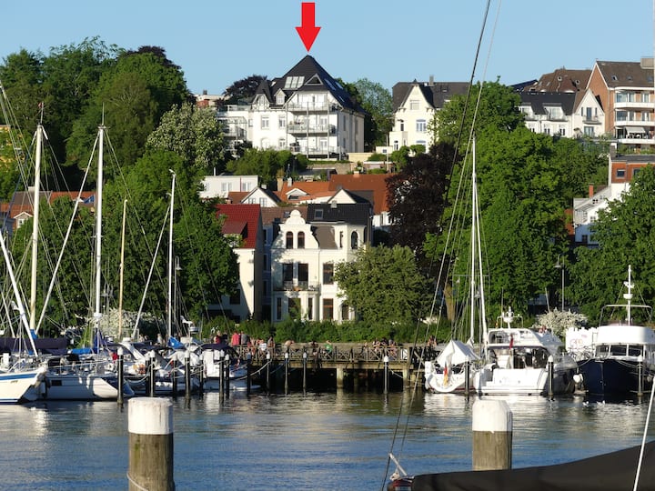 City villa with harbor panorama