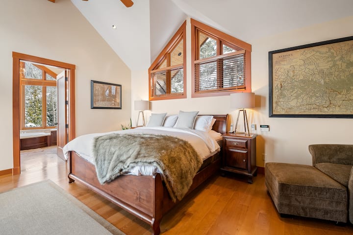 Master bedroom with smart tv & cable & fireplace.