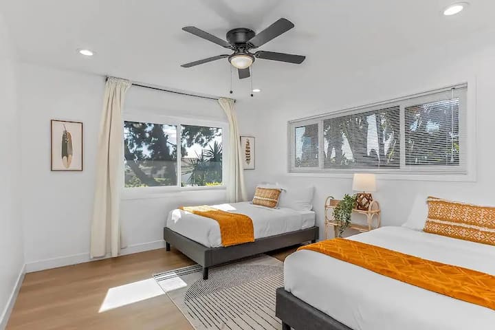 Guest bedroom with queen bed and full size bed