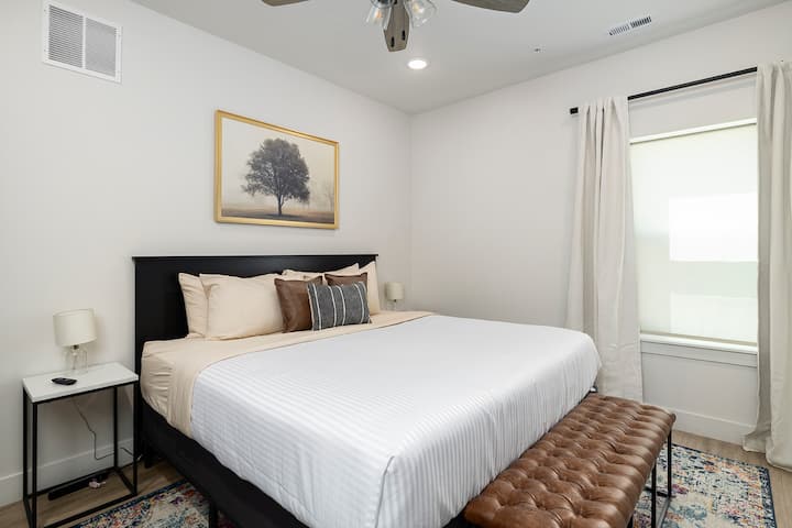 King bedroom on lower level with ensuite bathroom with shower. 