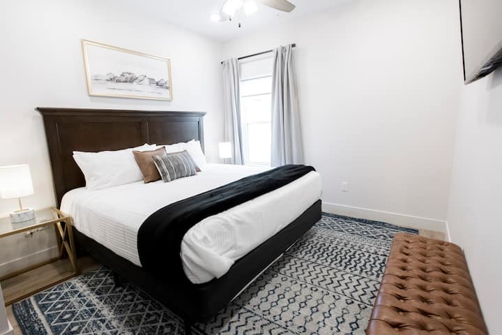 King sized bedroom on the lower level with ensuite bathroom with shower.