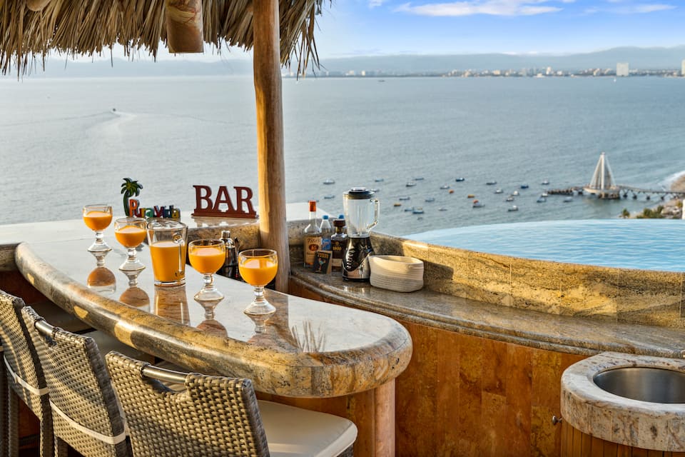 A palapa bar above Banderas Bay, Puerto Vallarta, Jalisco, Mexico, photo 1 of 10