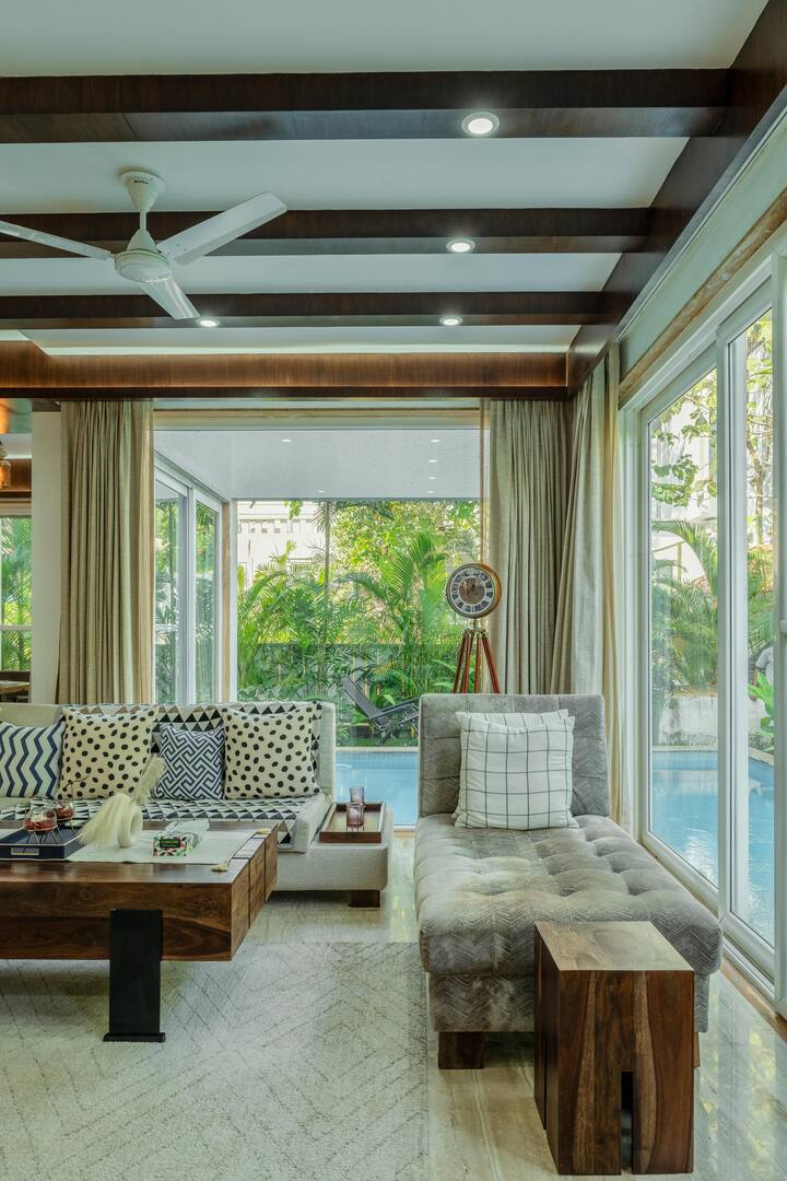 ✨Where the indoors melt into the outdoors☀️  
This cozy corner by the pool is made for morning coffee, golden hour chats, and doing absolutely nothing.✨