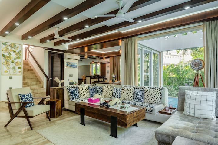 ✨Step inside sophistication ️✨  
This villa’s living room is where cozy meets chic — perfect for intimate conversations, late-night laughs, and a view that always invites you outside.✨