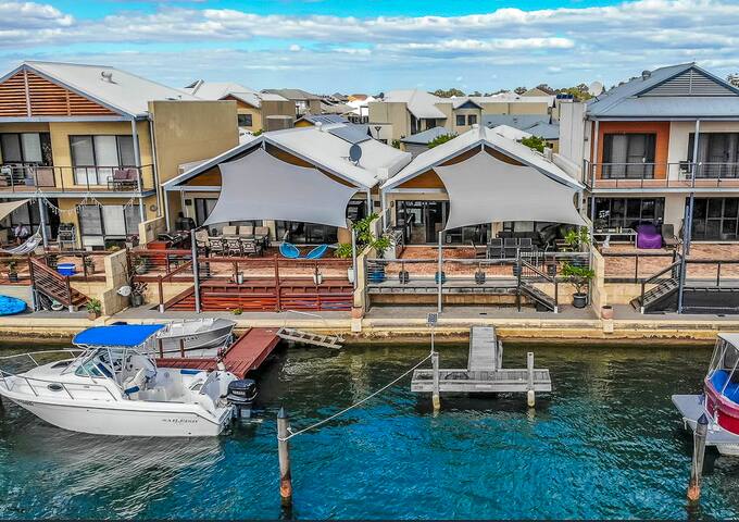 Canal Vista – dolphins, swans and sun. gallery image 2