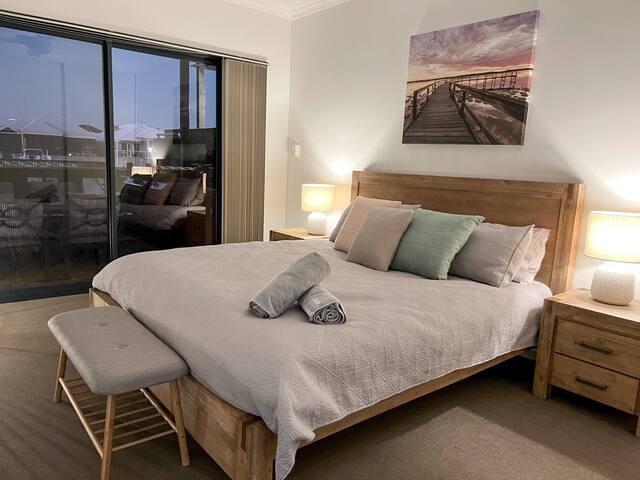 Canal Vista – dolphins, swans and sun. gallery image 5