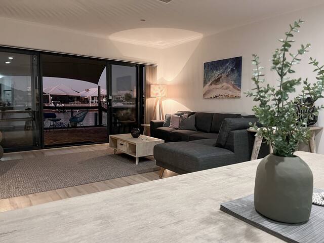 Canal Vista – dolphins, swans and sun. gallery image 3