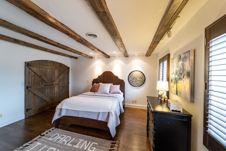 Secondary suite on the upstairs level.  Attached full bathroom.