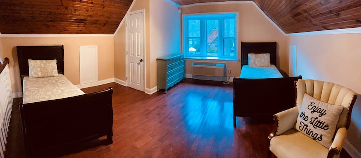 The loft boasts two twin beds and a vanity with shower.