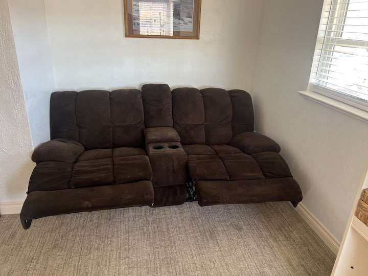 Reclining love seat in living room