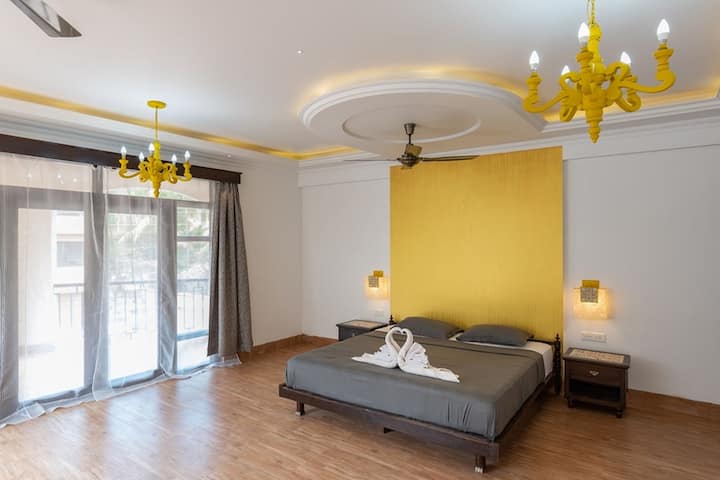 Luxurious and spacious Yellow bedroom