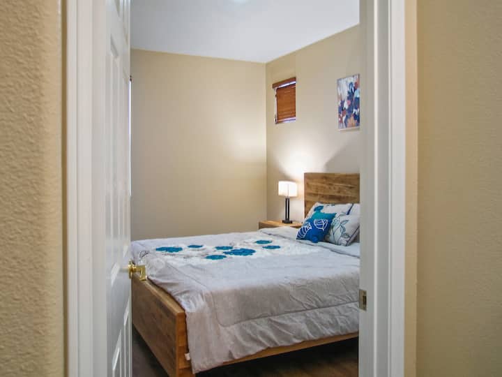 4th Bedroom on 1st floor with a King size bed, high quality mattress for a good night's sleep.