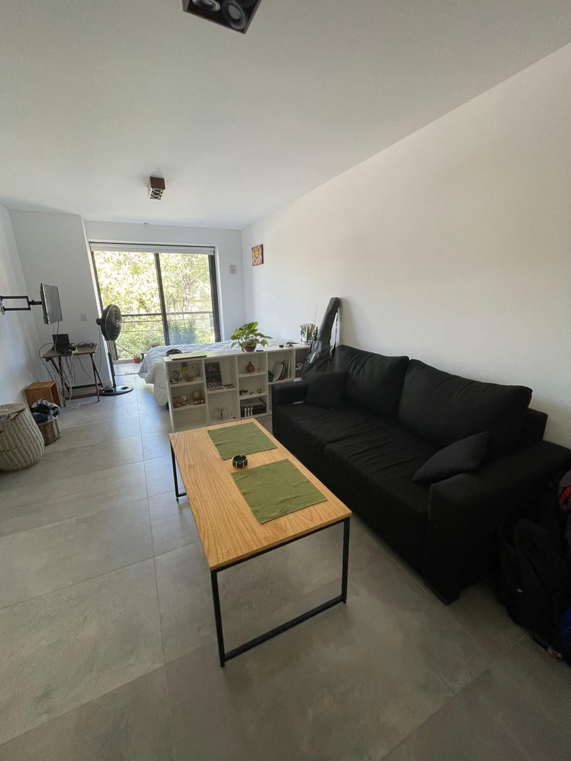 Large studio apartment with street-facing balcony in Chacarita
