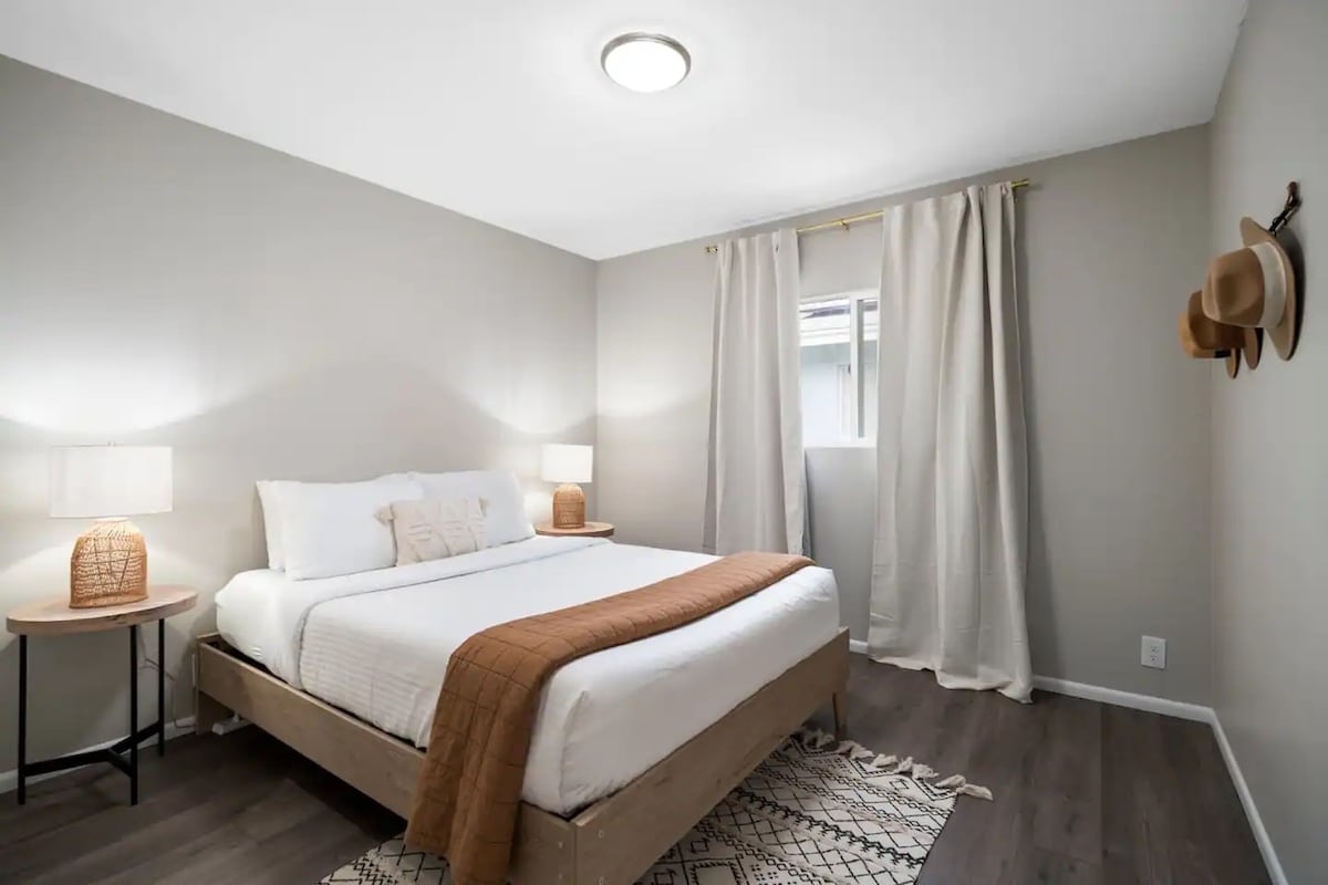 Guest Bedroom #2: A cozy bedroom with a queen-sized Leesa mattress (and blackout curtains).