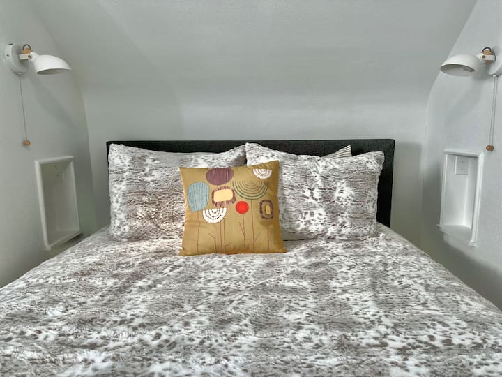 You'll love the use of this space with your own lamp, and built in charging nooks. 